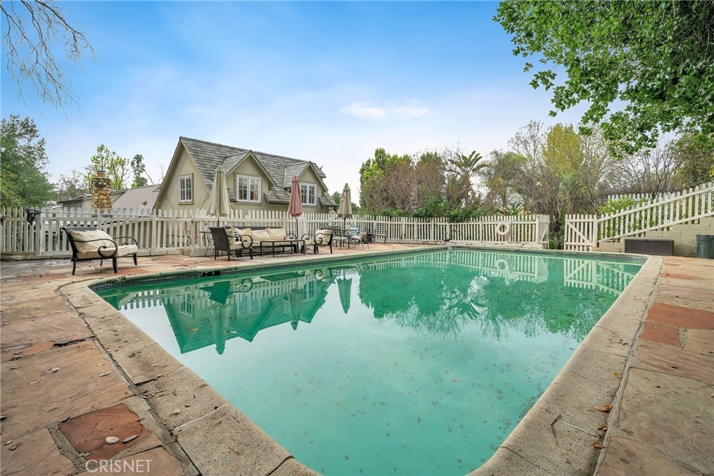 Take advantage of this excellent Woodland Hills Pool Home opportunity to own a truly unique and amazing abode in one of the most excellent neighborhoods!