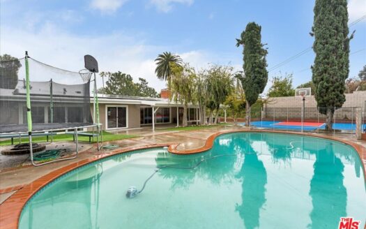 Desirable Woodland Hills Pool Home