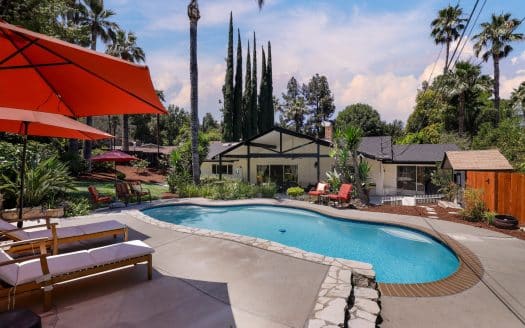 Resort-Style Pool Home on Half-Acre Lot in Woodland Hills